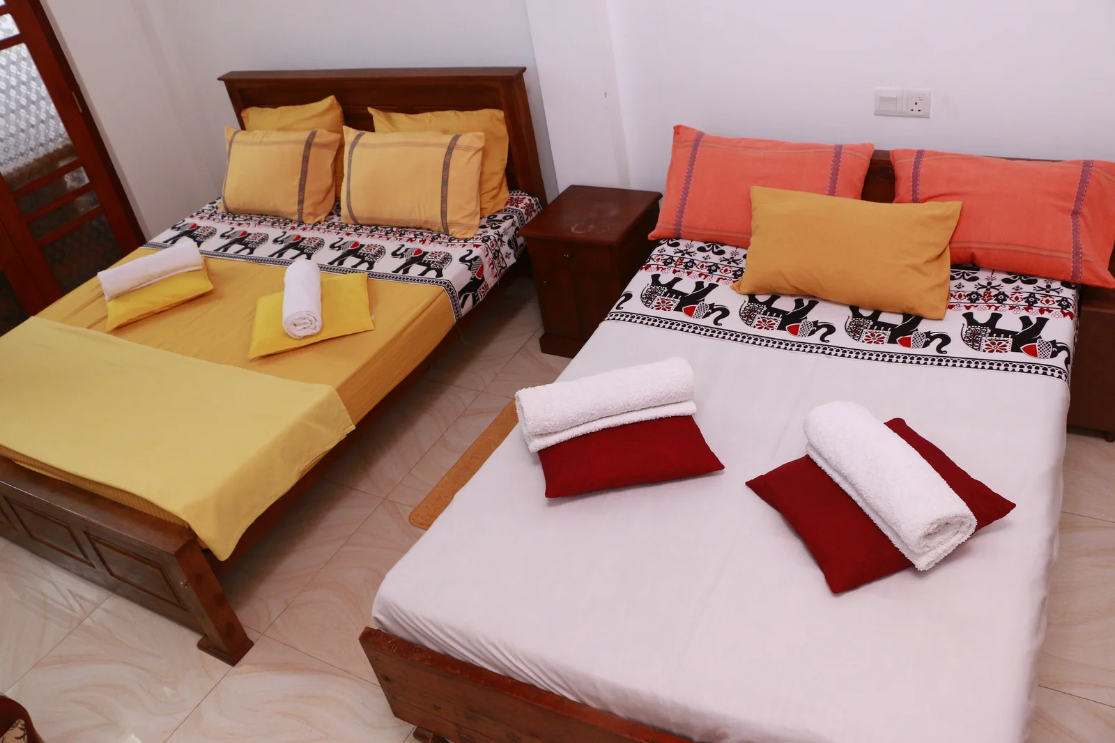 Deluxe Family Room — Wide view of the bedroom showing closet storage, desk and room layout