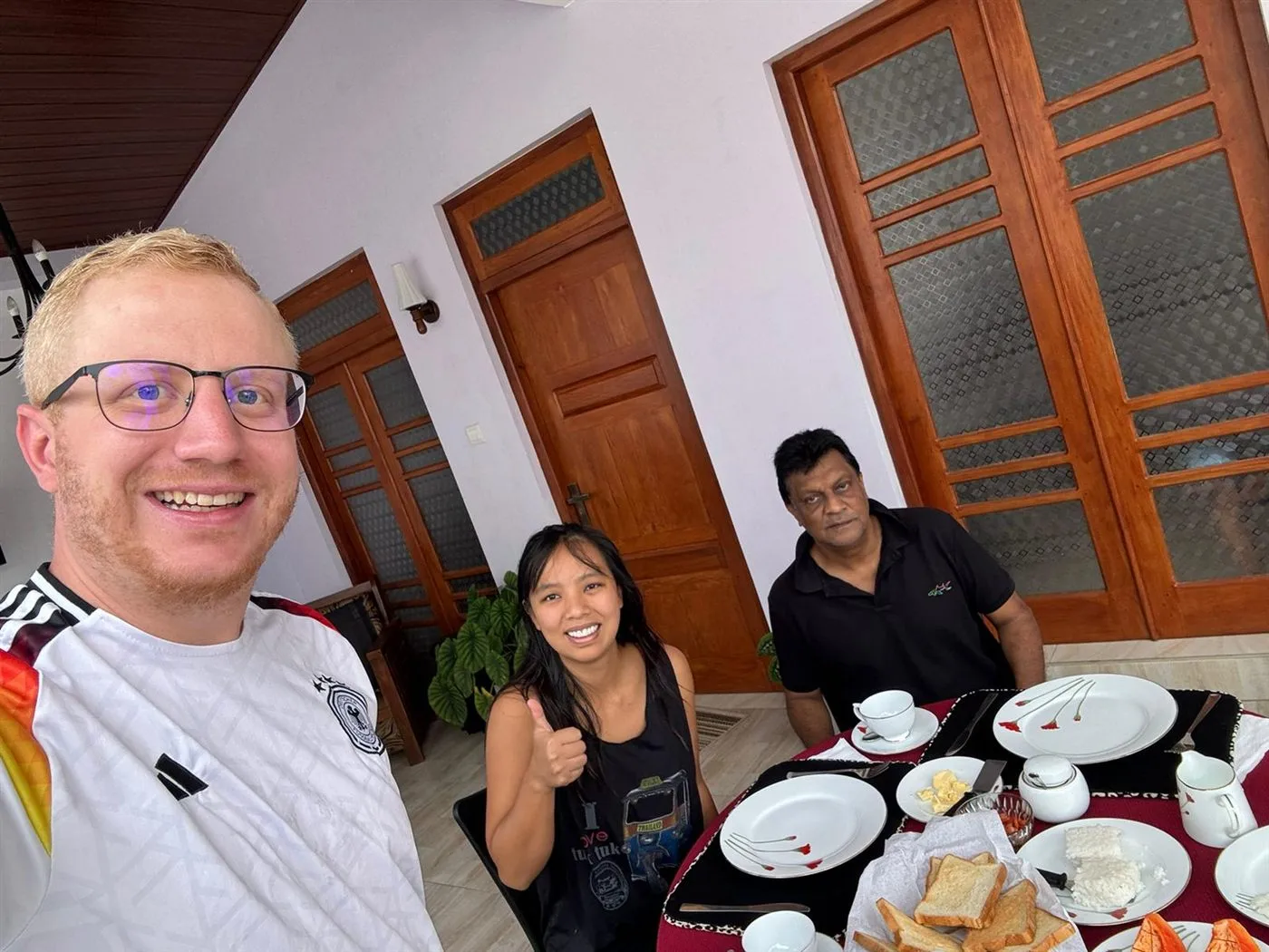 Guests enjoying fresh tropical breakfast at Innovick Residence